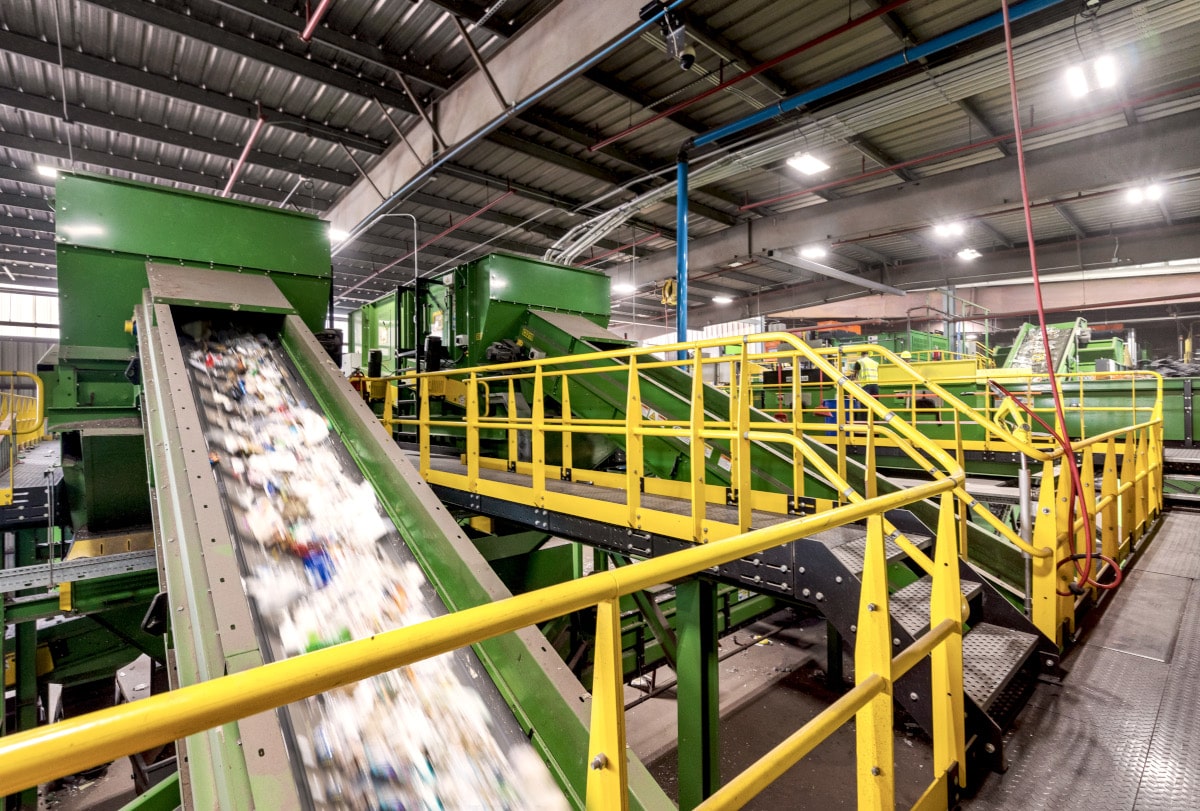 Material being processed for re-use at recycling facility